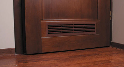 Two Sided White Door Air Vent Cover For Interior Doors 18 Inch By 5 Inch Universal Grille installed on a wooden door