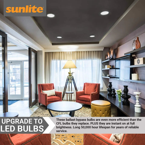 Modern living room with LED PLD Horizontal Plug In Light Bulb 9W Ballast Bypass, recessed lighting, and stylish decor.