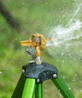 Rock Built Heavy Duty Brass Impact Sprinkler Head With Smooth 0 To 360 Degree Coverage Pattern For Big Time Patio Lawn Irrigation And Zero Drama Hose Hookup All Season, spraying water.