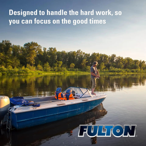 Person fishing from a boat on a calm lake with trees in the background, showcasing relaxing outdoor lifestyle.