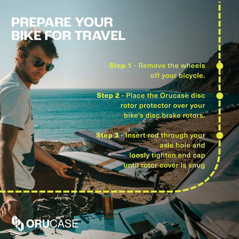 Man preparing bike with Travel Rotor Guard For Mountain Bikes Disc Rotor Protector To Keep 180 To 200 Millimeter Rotors Safe