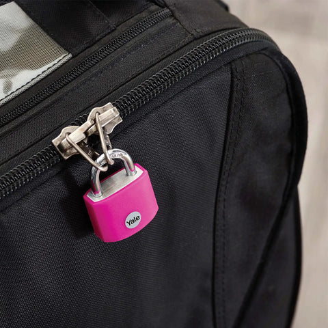 Pink Covered Aluminum Padlock With Three Keyed Alike Keys For Indoor And Outdoor Use Great For Gym Lockers Toolboxes And More Built Tough And Weatherproof Lock on black bag