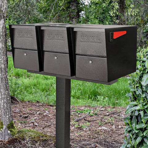 Three Mailbox Spreader Bar For One Post, Built Tough 12 Gauge Steel With Black Powder Coat, in outdoor garden setting.