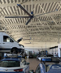 Industrial Grade 24 Ft HVLS Ceiling Fan With Built In VFD Brushless Motor And Remote Control in an automotive workshop.
