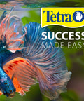 Straight Up Slick Aquarium Water Test Kit With Seven In One Fast Strips For Freshwater Saltwater Tanks measuring colorful betta fish underwater.