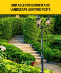 Garden path with stone steps and black metal lamp post surrounded by lush greenery, suitable for outdoor lighting.