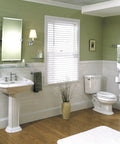 London Terrace Double Towel Bar 24 In Polished Nickel in small bathroom with solid brass construction and durable mounting hardware.
