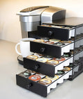 Black Satin 4 Tier Coffee Pod Drawer Organizer Compatible With K Cups Holds Up To 72 Pods on kitchen countertop next to coffee maker