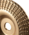 Duper Smooth 6pc Angle Grinder Wood Carving Discs With Vibration Reduction High Elastic Cushion close-up of textured metal disc.