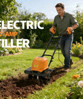 Person using Beast Corded Garden Tiller Cultivator with Foldable Handle 14 Inch 12 Amp Motor Four Steel Tines in a garden