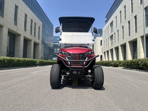 Front view of Top Tier Four Seater Electric Golf Cart Built With A Solid Front Bumper And Aggressive Off Road Tires Including HD LED Smart Dashboard.