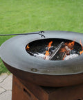 16 Inch Fire Pit Poker With Heat Resistant Resin Handle, Built Tough Campfire Tool For Indoor And Outdoor Use shown by a fire pit