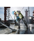 Worker using SpeedX SDS Max Rotary Hammer Bit With Four Cutter Head And Carbide Tip For Fast Drilling Beast Mode Power on construction site