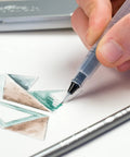 Water-Soluble Graphite Pencils Set With Aquarelle Finish, Six HB Pencils in use for watercolor effect with teal and brown shading
