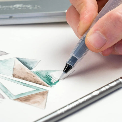 Water-Soluble Graphite Pencils Set With Aquarelle Finish, Six HB Pencils in use for watercolor effect with teal and brown shading