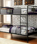 Twin Over Twin Metal Bunk Bed With Attached Ladder Full Pipe Frame Upper Guard Rails Antique Black Finish Built Tough For Boys And Girls Ideal Space Saving Loft Bed in a cozy room setting with brick walls and decorative pillows.