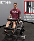 Man using Leg Extension And Leg Curl Machine For Home Gym Adjustable With 8 Thigh And 6 Back Positions Up To 150 Lbs