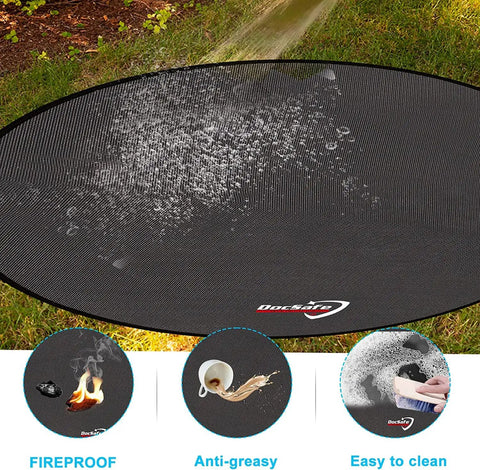 48 Inch Round Fire Pit Mat With Four Layer Fireproof Heat Insulated Under Grill Pad on grass, showcasing waterproof feature with water splashes.