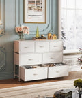 Seven Drawer Dresser And TV Stand With Wood Top, Fabric Storage Tower, white, sturdy steel frame, in elegant room setting.