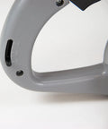 Close-up of thumb control gate on Hand Crank Turf Spreader With Thumb Control Gate, 1.6-Liter Red Poly Hopper Scoop.