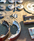 Metal parts on sandblasted surface using Aluminum Oxide Fine Sand Blasting Media 19 Pounds For Cabinets And Guns Hard Sharp Grit