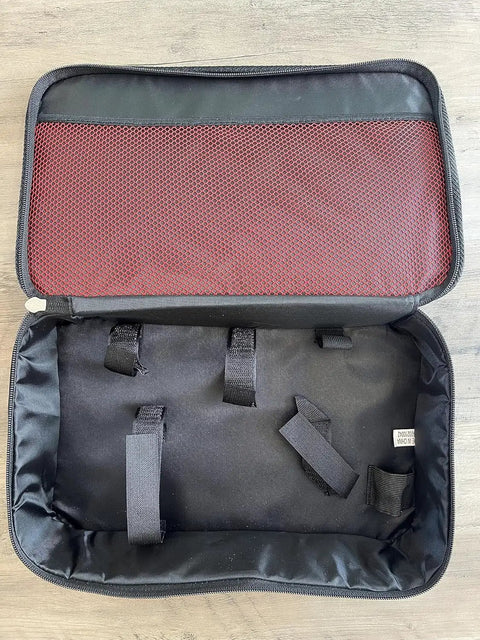 Open Pro-Grade Tool Bag For Pros In Red And Black with compartments and straps, suitable for M12 system tools, job site use