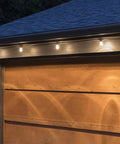 Backyard Bistro Style 24 Foot Outdoor String Lights With 12 Shatter Resistant Lifetime Bulbs, 2200K warm white on a garage