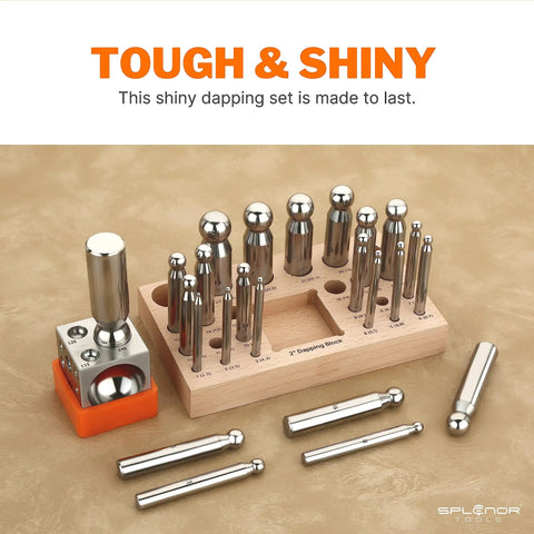 Dope 2 Inch Square Dapping Block With 24 Punch Set displayed on a wooden stand with rubber base for jewelry making and metal forming.