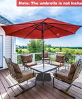 Heavy Duty 200 Lb Umbrella Base With Two Sandbags For Market Patio And Poolside Use, Adjustable Knobs, All Weather Cover, Fits Poles Up To 1.9 Inches, Large Outdoor Stand For Patio Tables And Umbrellas on a deck with red umbrella