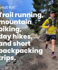 Person trail running on path by river, promoting Ultra Lite Outdoor Bathroom Kit for Hiking, Trail Running, Mountain Biking, and Bikepacking.