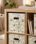 Six Piece Wild Floral Fabric Storage Cubes With Handles displayed in a cube shelf, featuring a vibrant floral pattern.