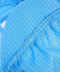Close-up of lightweight blue anti static work caps designed with breathable mesh for cleanrooms and workshops.