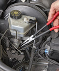 Extra Long Angled Needle Nose Pliers 11 Inch Slim Profile With Four Groove Jaws gripping small pipe in engine bay