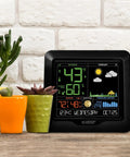 Color Forecast Station With Big Display And Temperature Humidity Alerts, Seasonal Scene Backgrounds, Indoor Outdoor Monitoring on table