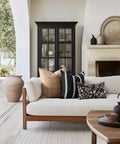 Cozy living room with sofa featuring Modern Farmhouse Fall Linen Throw Pillow Cover 20x20 In Outdoor Indoor Water Repellent Reversible Black