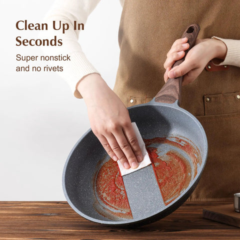 Person cleaning Kickin Nonstick Frying Pan With Swiss Granite Coating For Effortless Omelets And Everyday Cooking PFOA Free Stone Cookware
