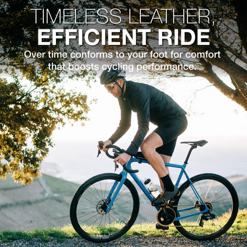 Cyclist riding a bike with Christophe Leather Toe Straps With Steel Buckles For Track Touring Vintage And Fixed Gear Bikes