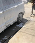 Vehicle being cleaned with Foam Cannon For SPX Series Pressure Washers With Five Nozzle Tips And One Quarter Inch Quick Connector