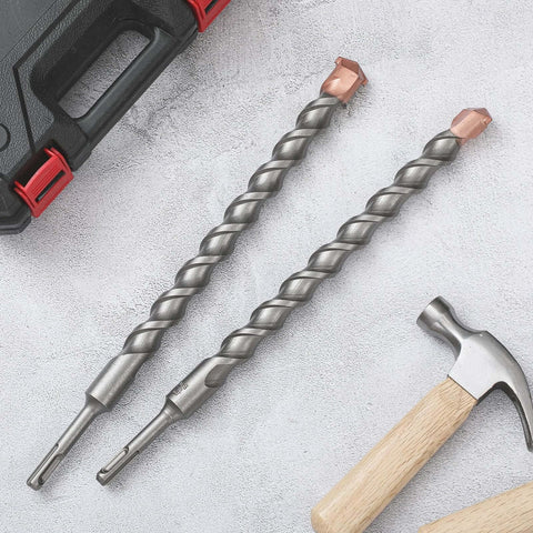 Two 1-inch x 14-inch carbide-tipped SDS-Plus rotary hammer drill bits with copper tips.