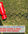 Speed Trap Two Point Zero Golf Swing Trainer with red rod and tethers, Made In USA Polycarbonate Base, on grass