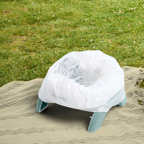 Road Warrior 2 In 1 Portable Baby And Toddler Travel Potty Seat With Secure Snap Ring Lightweight Foldable Design on grass.