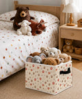 Chill Out The Clutter With These Adorable Dog Paw Print Foldable Storage Bins featuring stuffed animals in a child's bedroom.