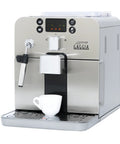 Super Automatic Espresso Machine With One Touch Brewing Delivers Solid Daily Grinds And Straight Fire Shots That Hit Different Every Time In A Sleek Silver Body. Close-up side view with a cup.
