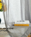 Linen-Feel Sheer Curtains 2 Panels With Grommet Top, Light Filtering Drapes, Dark Grey, 52x84 Inches with books and vase