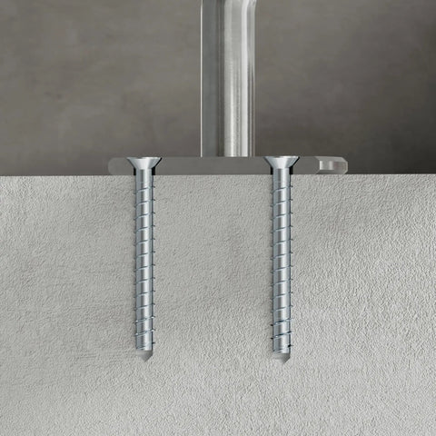 Two 3/8 Inch By 5 Inch Countersunk Head Titen HD Heavy Duty Screw Anchors For Concrete And Masonry installed in concrete