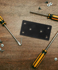 Beefy Heavy Duty Flat Plate Corner Brackets With Screws Black 10x5cm Set for tables and chairs, shown with tools and screws on wood