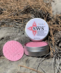 Open tin with pink disc of Eight Disc Fire Starter Kit With Waterproof And Windproof Discs Delivers 7 Minute Burns For Emergencies