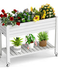 Elevated Garden Bed On Four Legs With Four Lockable Wheels And Storage Shelf For Balcony Patio Backyard Divisible Resin Planter Box 33.6 Inch Tall Back Friendly No Bending Needed Ergonomic Design with colorful flowers and plants