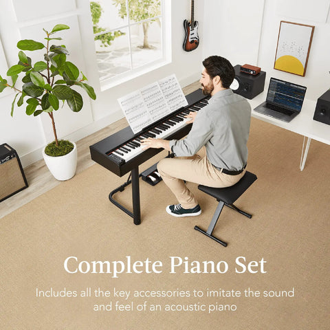 Man playing 88 Key Weighted Hammer Action Digital Piano Set with U Stand, 3 Pedal Unit, Stool in bright room