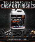 Pro Grade Ultrasonic Gun Cleaner Solution That Hits Different On Stubborn Carbon And Gun Oil With Zero Hard Scrubbing One Concentrated Gallon Mixes Straight Into Two Hundred Ready To Shoot Parts USA Made in a detailed kitchen setting with gun parts.